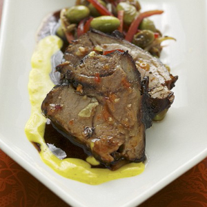 raised lamb shoulder on turmeric sauce